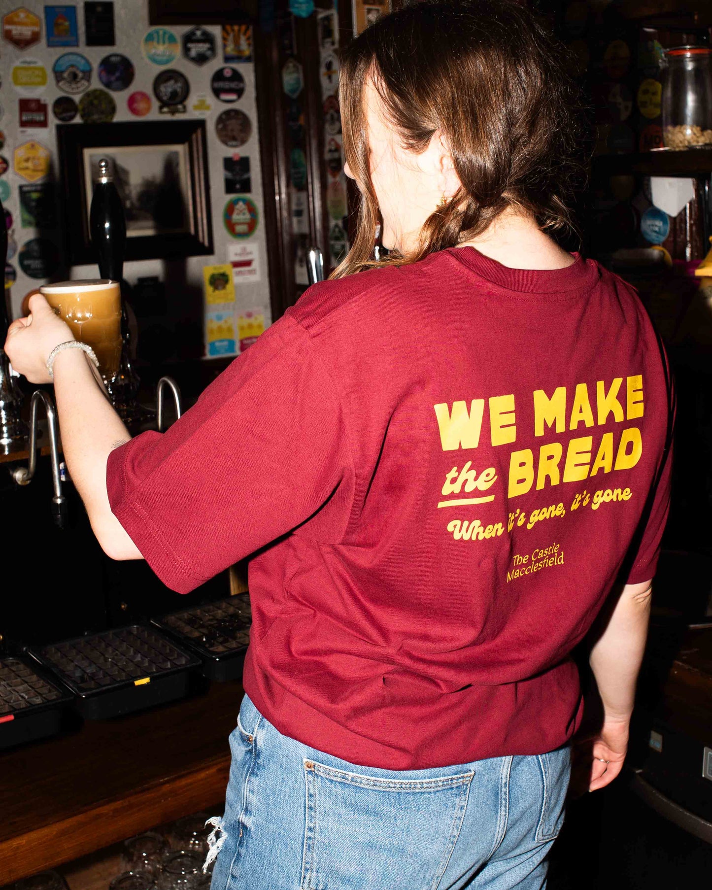 we make the bread, the castle officiale tee in burgundy