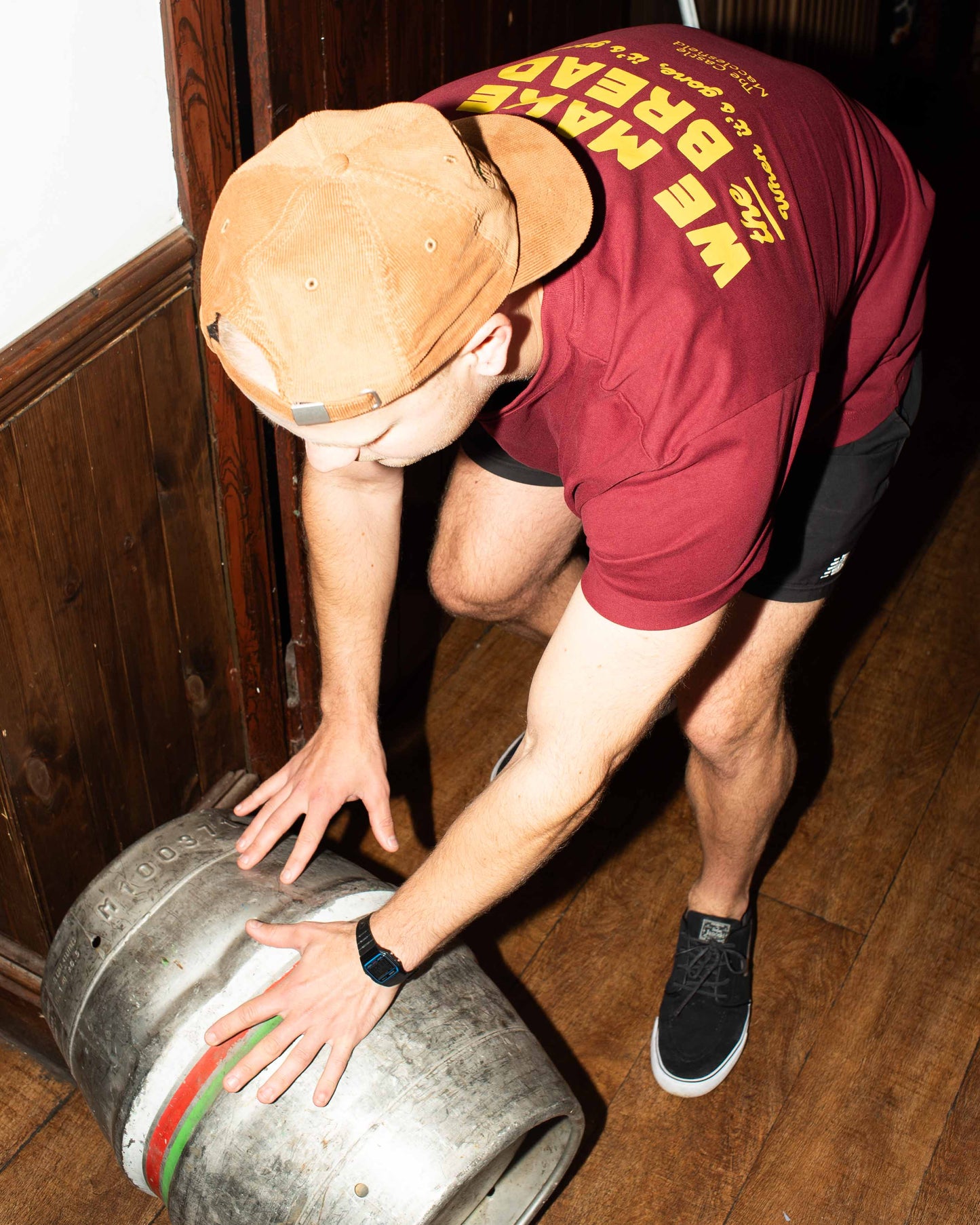 we make the bread, the castle officiale tee in burgundy